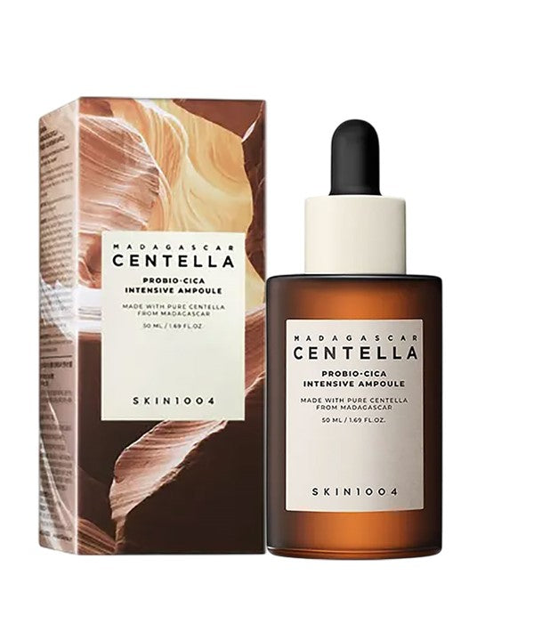 SKIN1004 Madagascar Centella Probio Cica Intensive Ampoule moisturizer bottle with green and white labeling, showcasing skincare product.