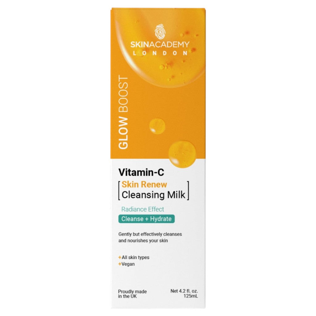 Skin Academy Glow Boost Vitamin C cleansing milk bottle, 125ml, featuring a white and orange label, for skin renewal and brightening.