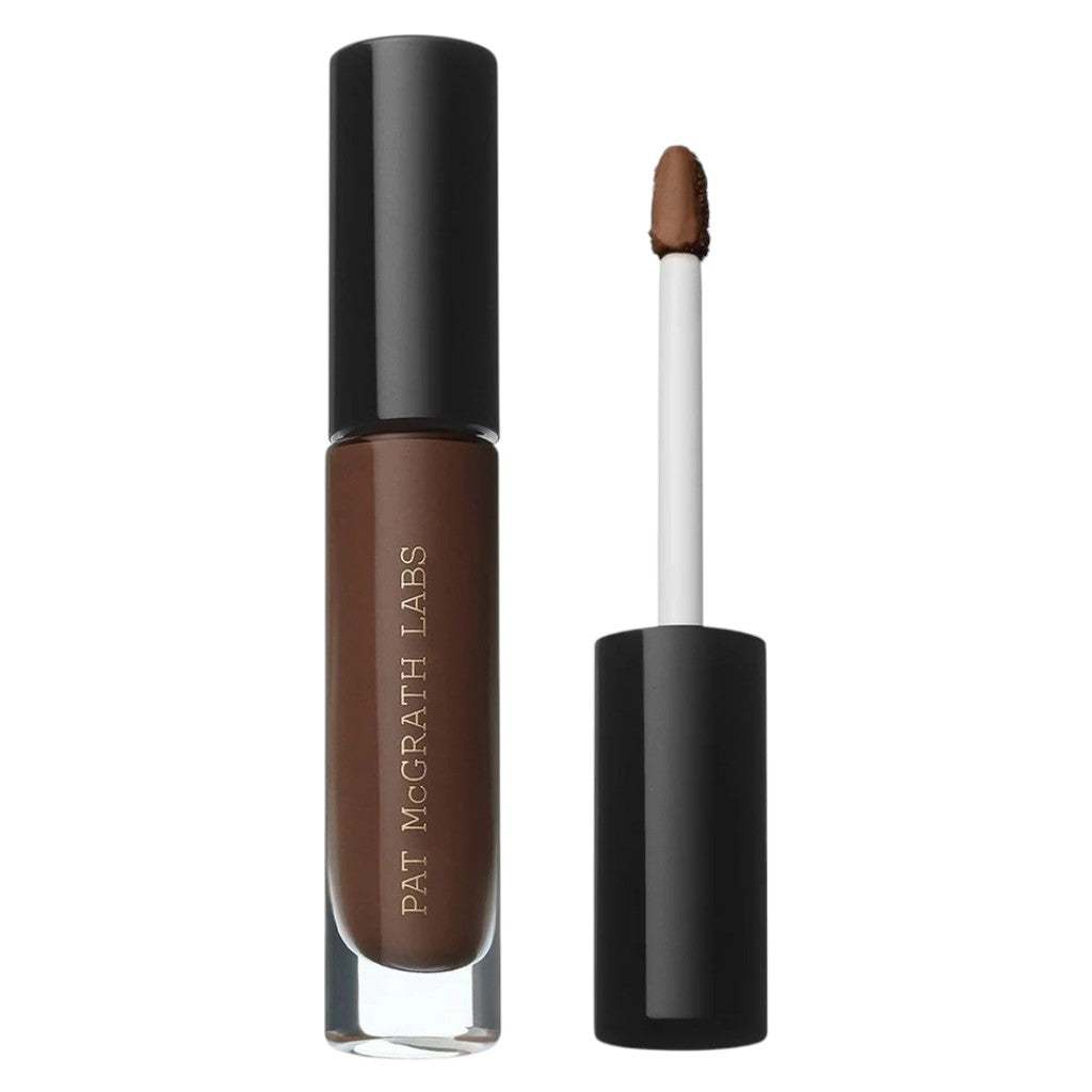 PAT McGrath Labs Skin Fetish Sublime Perfection Concealer face makeup tube and applicator roller on white background