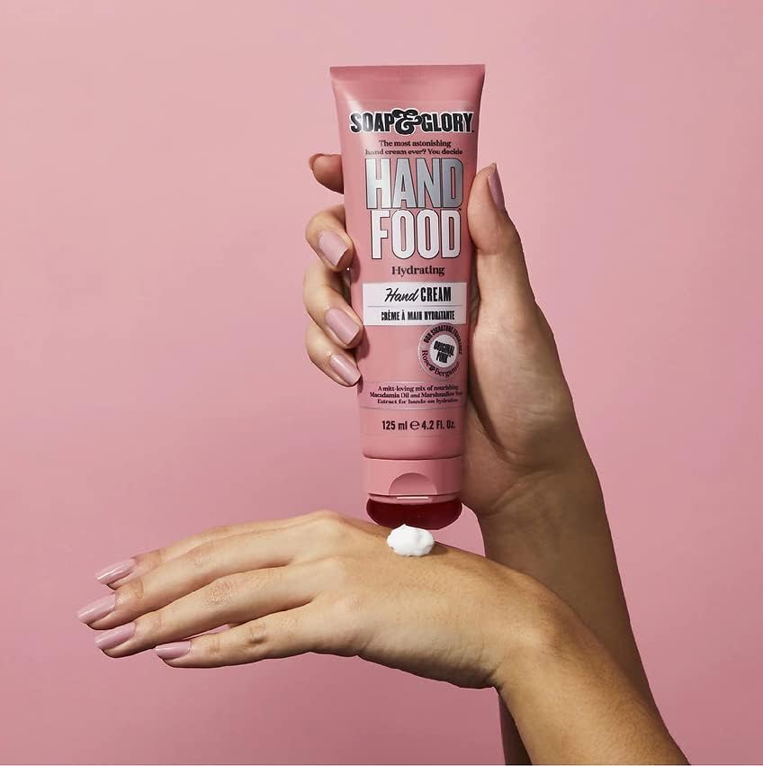 Soap and Glory Hand Food hydrating hand cream in a 125ml tube, showcasing smooth, moisturized hands with the product.