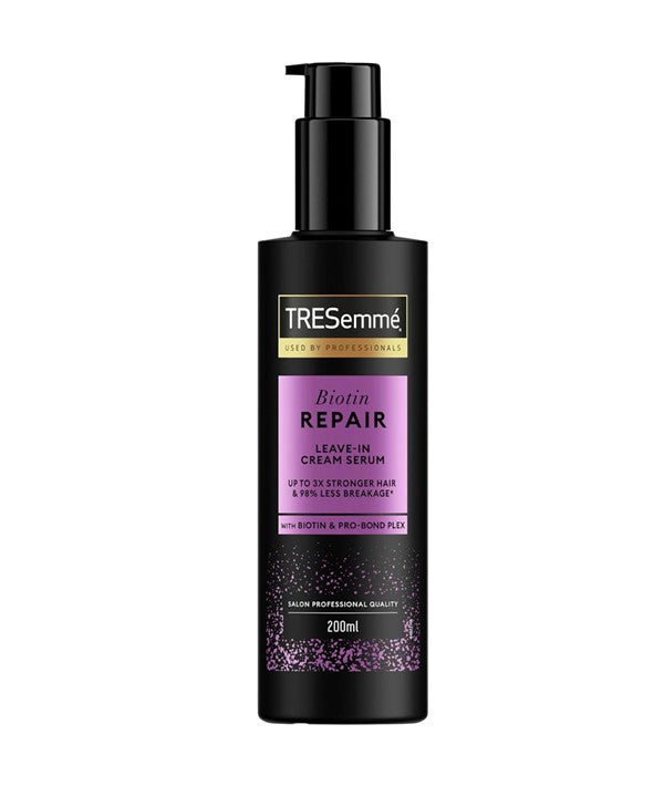 TRESemme Biotin Repair Leave-In Cream Serum for hair treatment, featuring nourishing biotin for stronger, healthier hair.