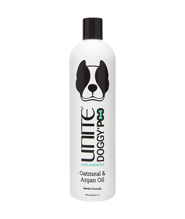 Unite Hair Doggy Poo oatmeal and argan oil dog shampoo bottle with label, designed for pet grooming and coat nourishment.
