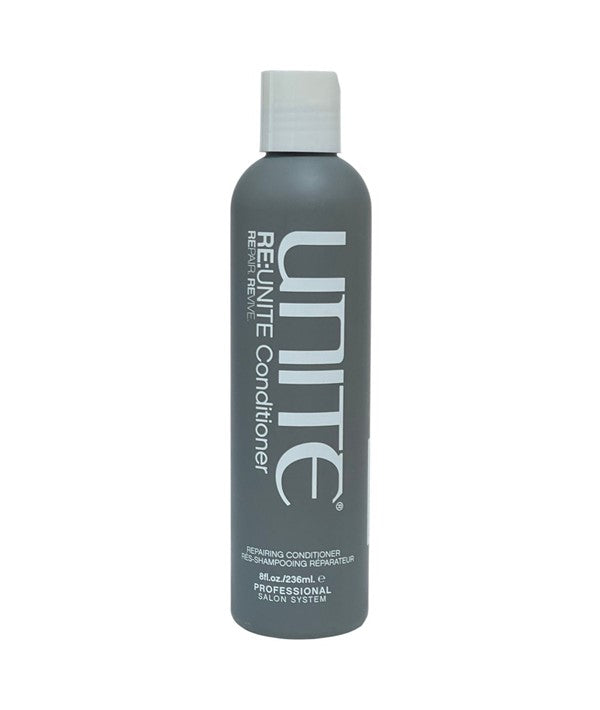 Unite Hair Re Unite Repairing Conditioner bottle with pump dispenser, creamy formula for damaged hair, on a neutral background
