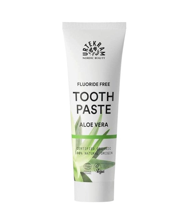 Urtekram fluoride-free aloe vera toothpaste tube showing natural aloe vera branding and dental care packaging.